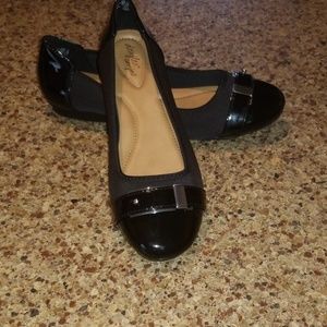 Dexflex black patent dress shoes with buckle.